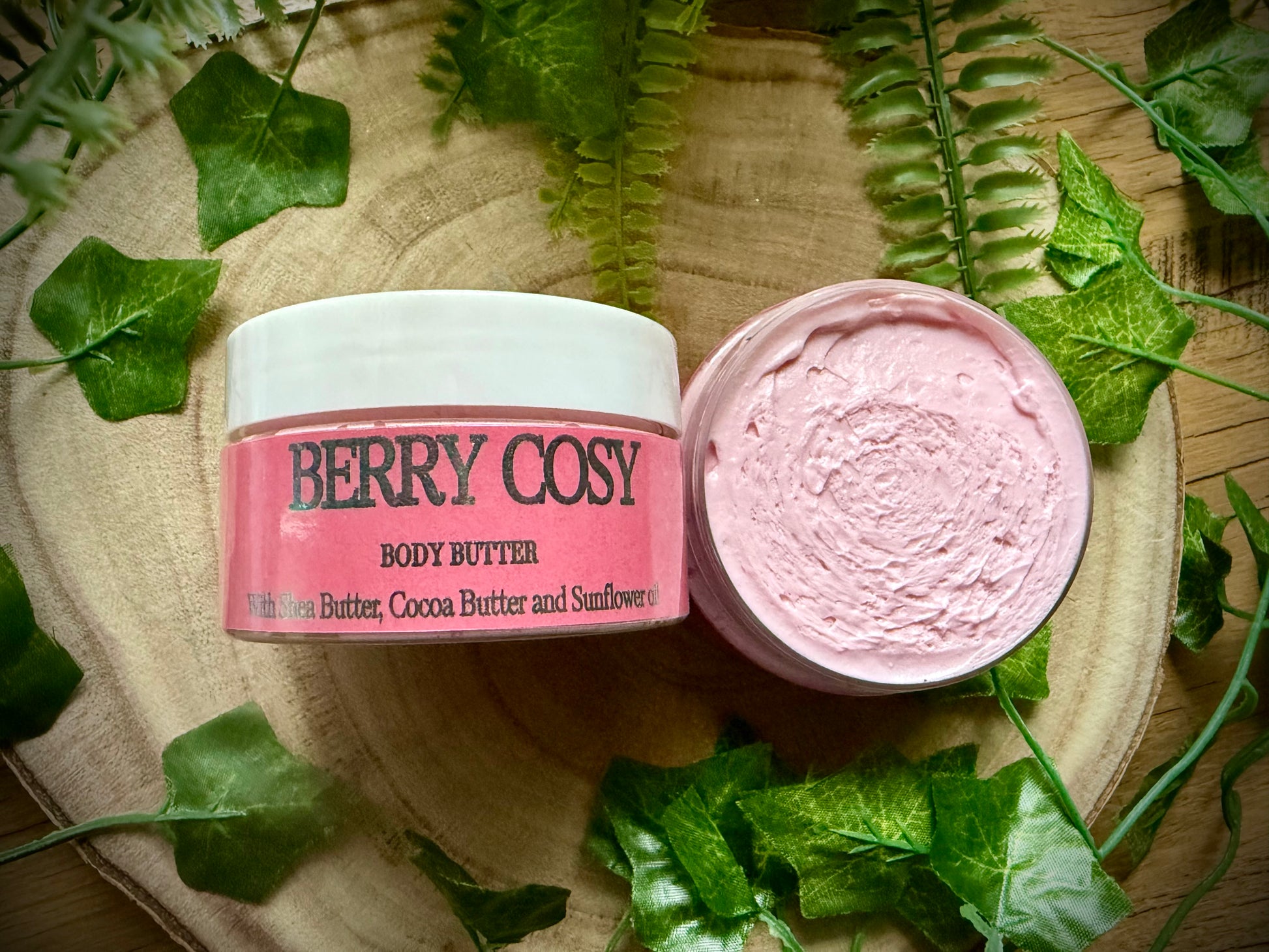 Handmade body butter made with cocoa butter, shea butter, fragranced with a Berry fragrance.