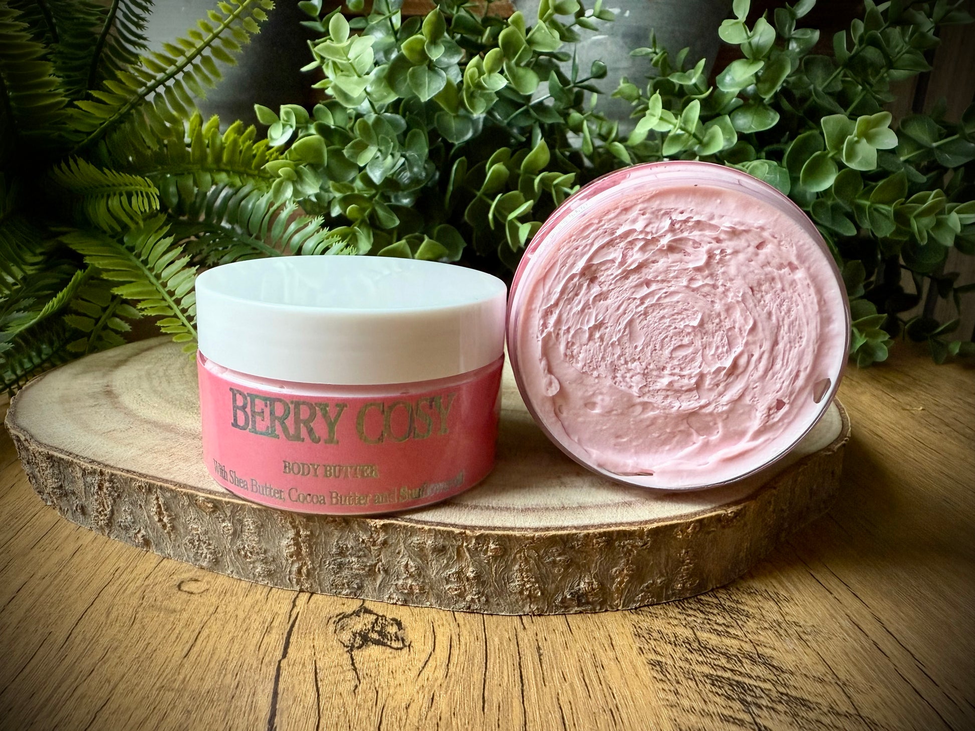 Handmade body butter with a berry fragrance and shea butter and cocoa butter.
