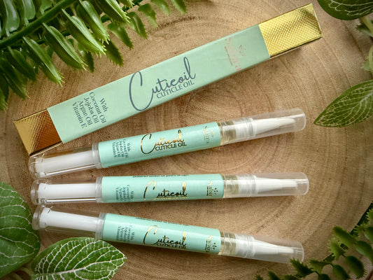 Cutieoil Cuticle oil with Argan oil, Jojoba oil, Coconut oil, and Vitamin e. 
