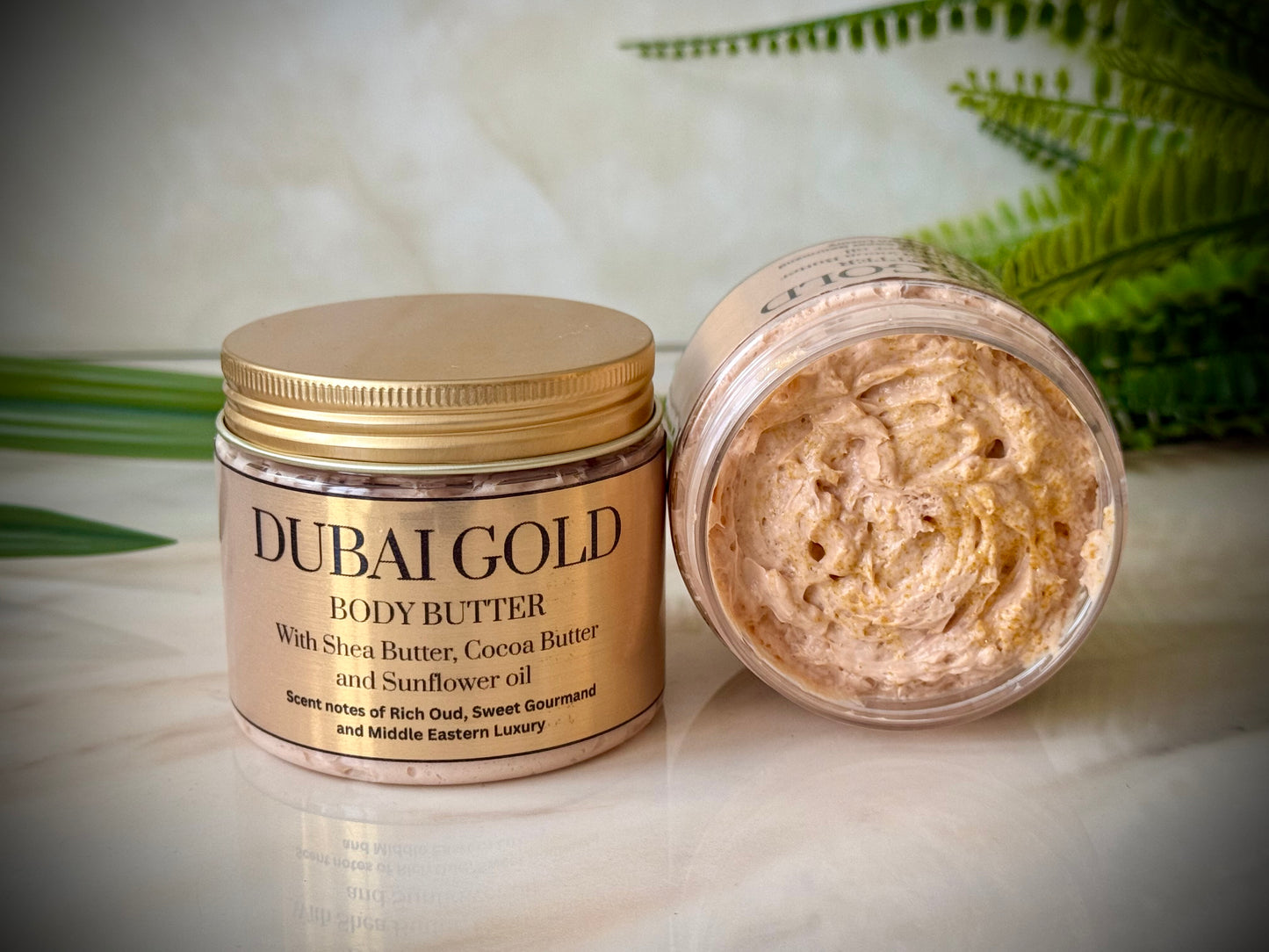 Rich nourishing Body butter with shea butter cocoa butter and sunflower oil and a golden shimmer.