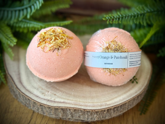 XL Bath bomb with Sweet orange & Patchouli essential oils and calendula petals on top. 