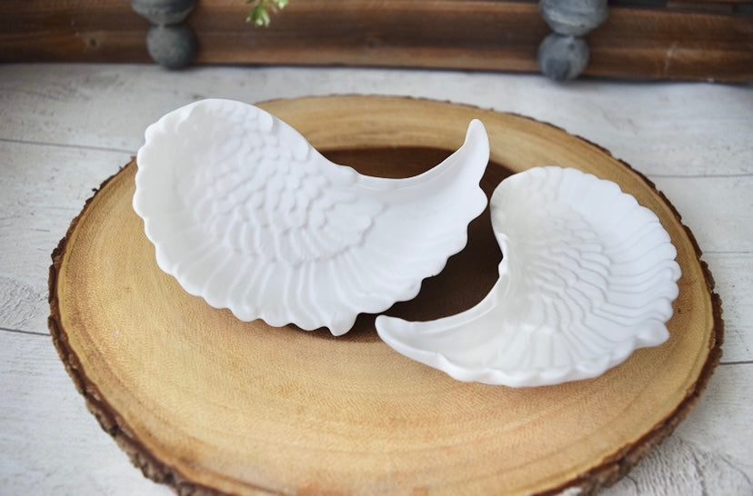 Handmade Angel wing trinket trays made with eco resin.